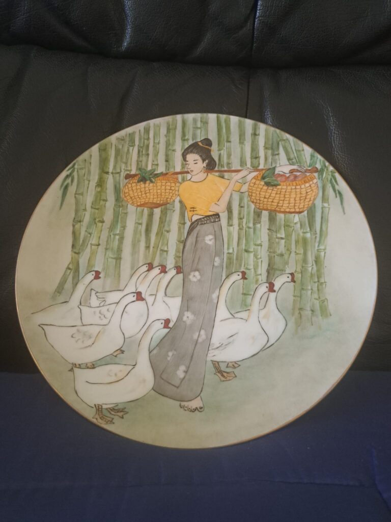 A tranquil scene of harmony between a woman and geese, crafted by a Driftwood Art Society artist